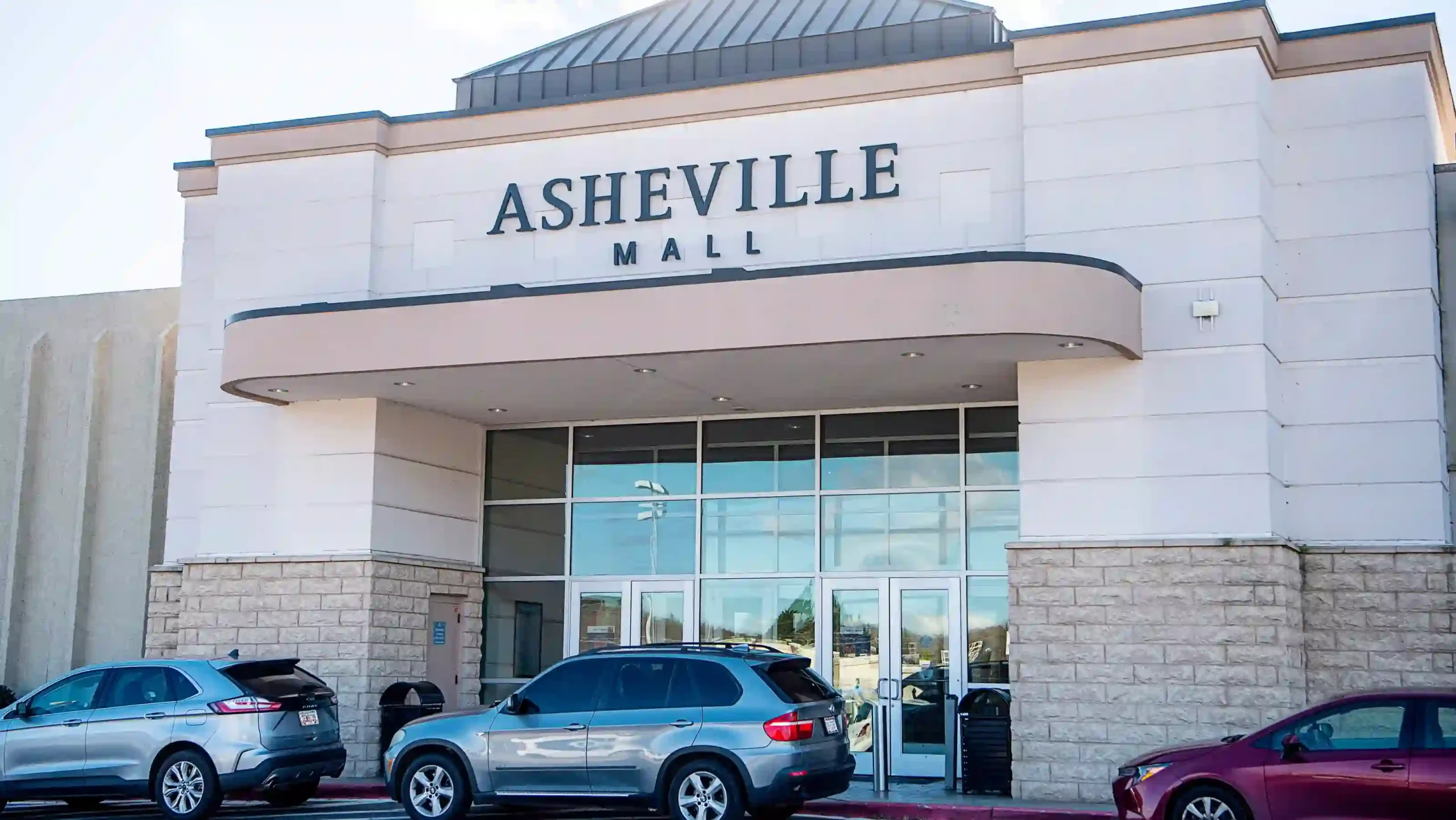 car parked infront of asheville mall main gate