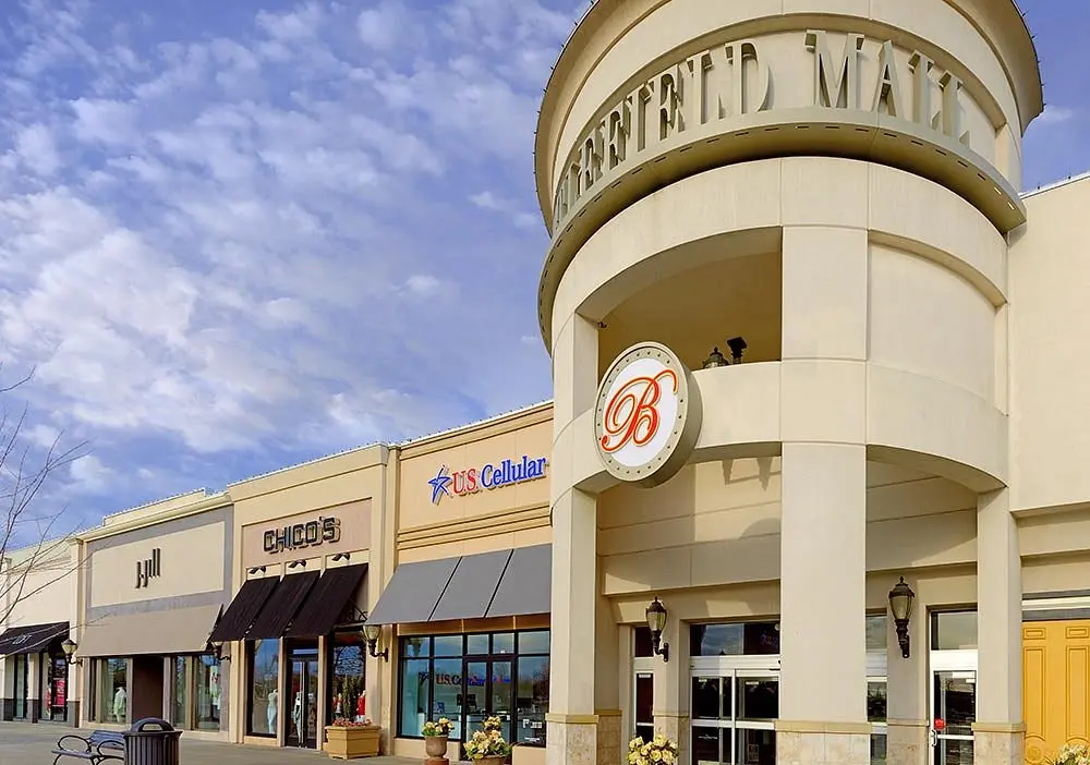 A large building with a sign that reads 'Battlefield Mall'.