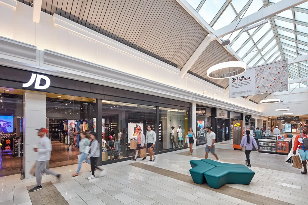 Aretail center in New Hyannis, MA featuring Cape Cod Mall in the cityscape.