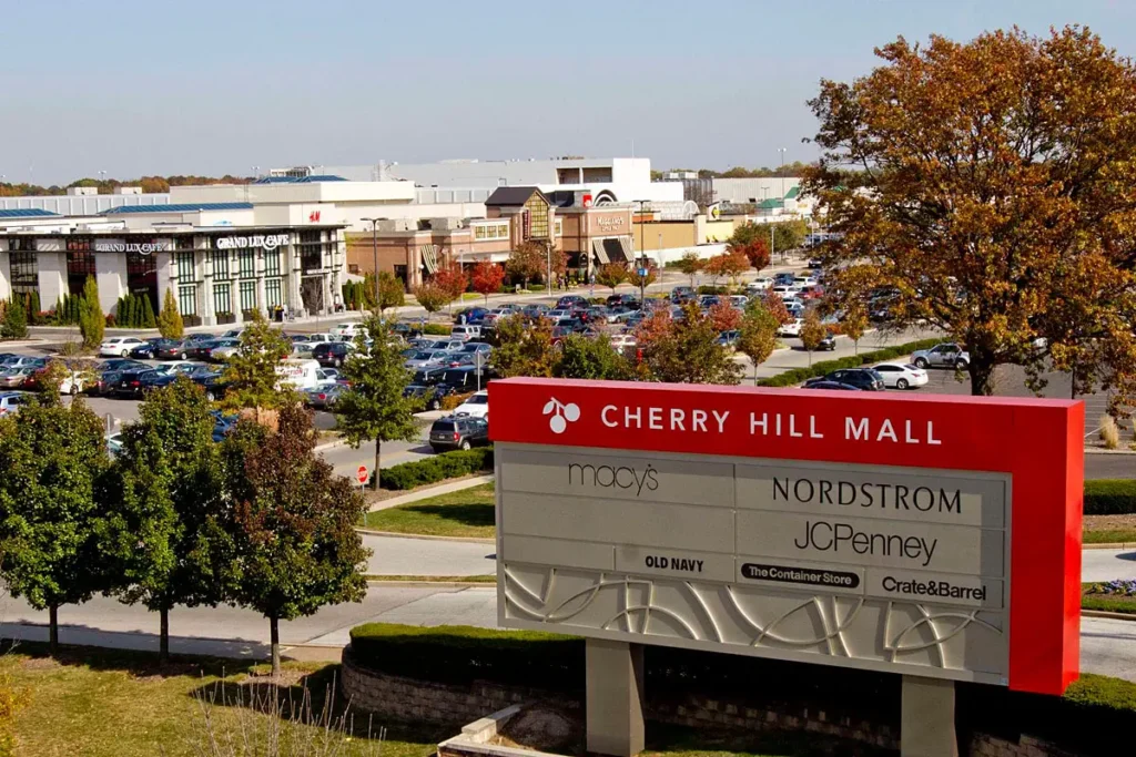 Sign for Cherry Hill Mall in parking lot.