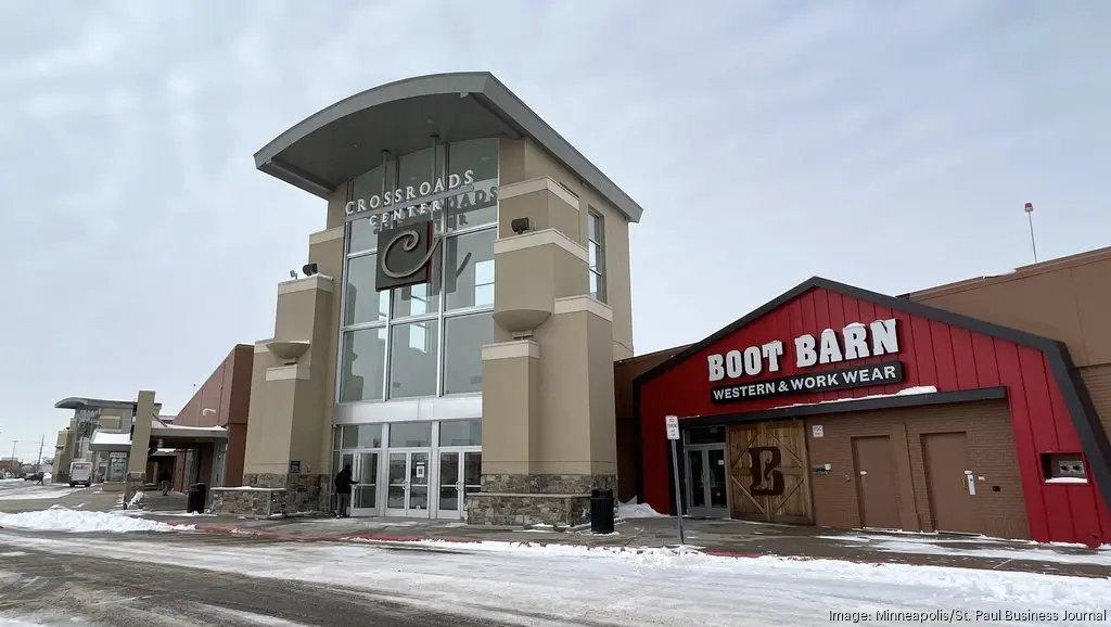 Crossroads Center: A bustling shopping mall with stores, restaurants, and people walking around.