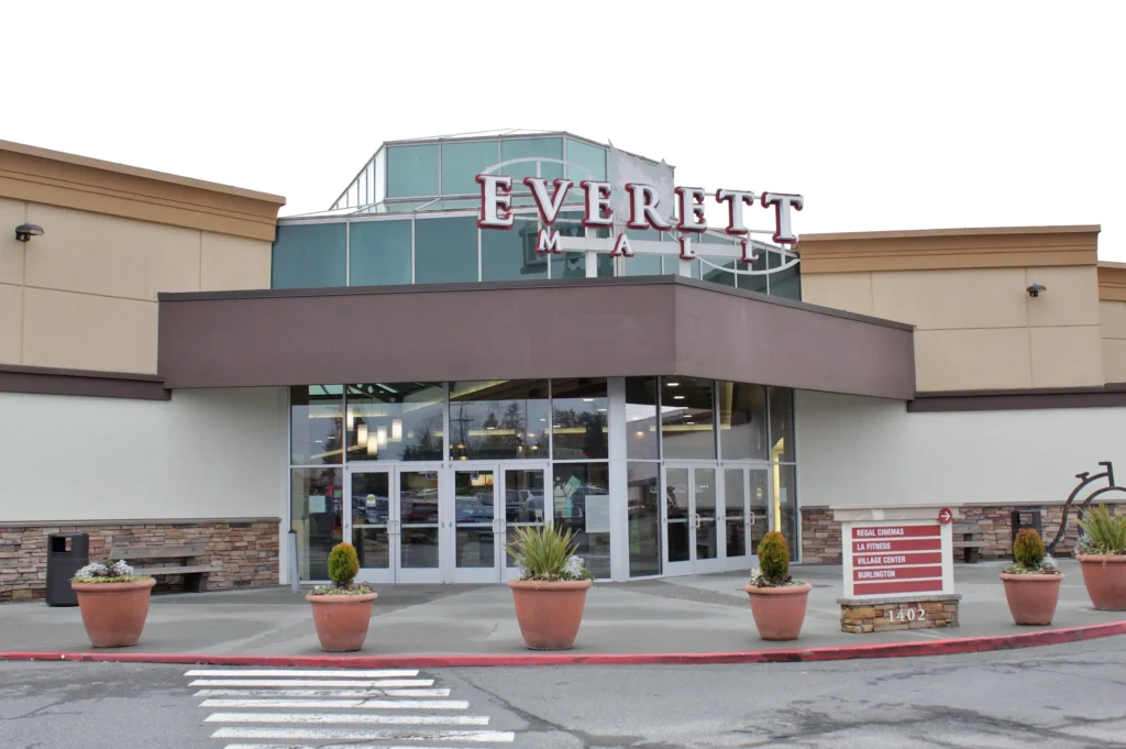 Exterior view of Everett Mall with various stores and parking lot.