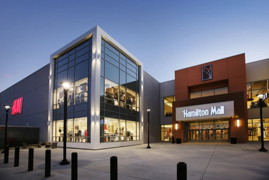 A large building with a glass front, located at Hamilton Mall.