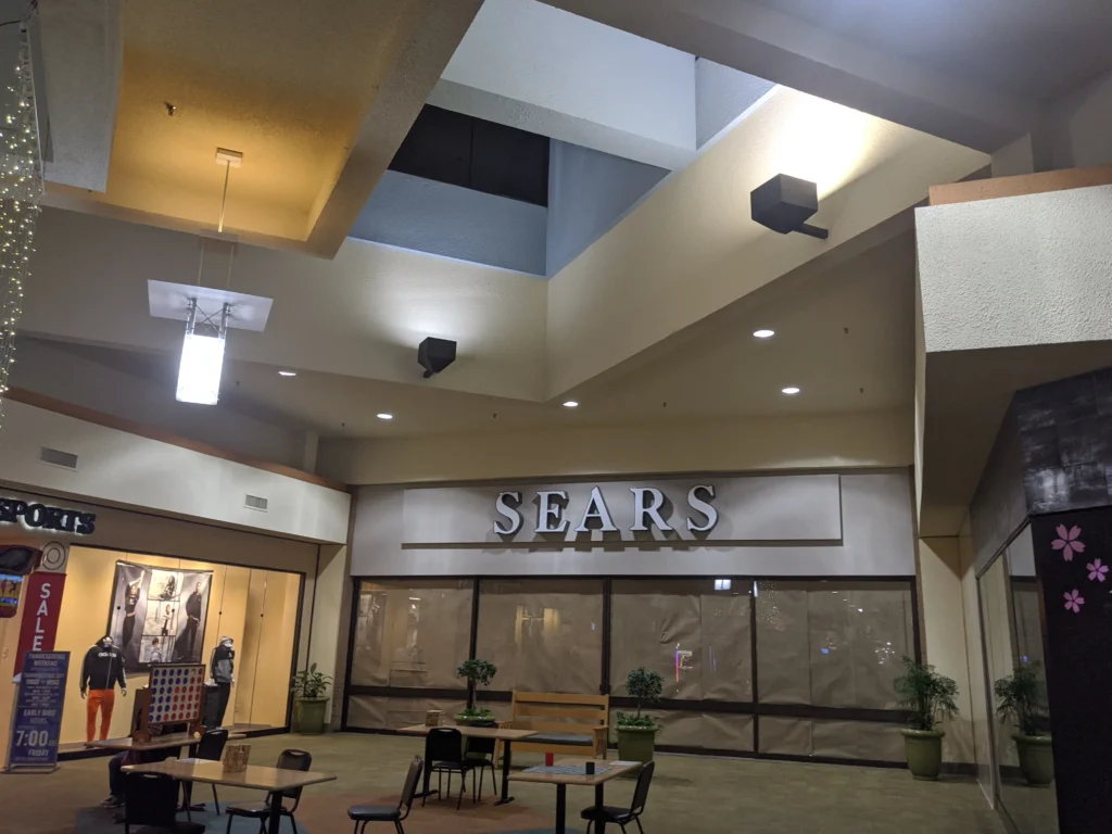 A spacious store with a prominent Sears sign, located at the Mall of Abilene.