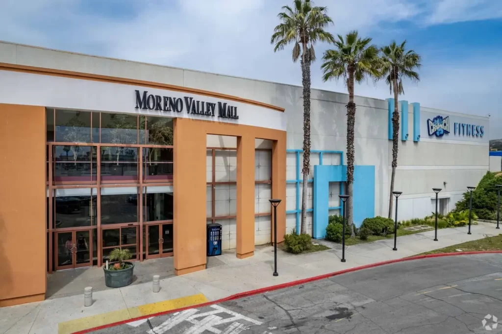 Aerial view of Moreno Valley Mall, a bustling shopping center with various stores and a large parking lot.