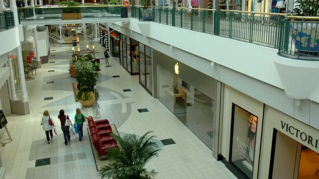 A bustling mall with shoppers walking around at North Point Mall.