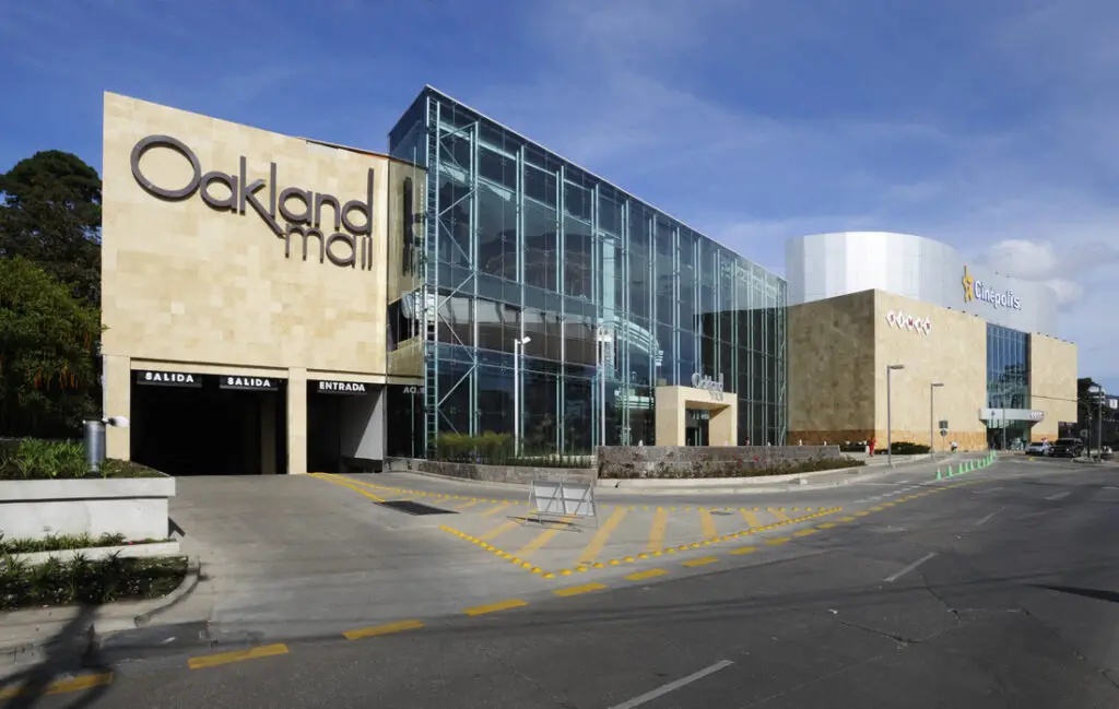 A bustling shopping center in Oakland, CA - Oakland Mall offers a variety of stores and a vibrant atmosphere for shoppers to enjoy.