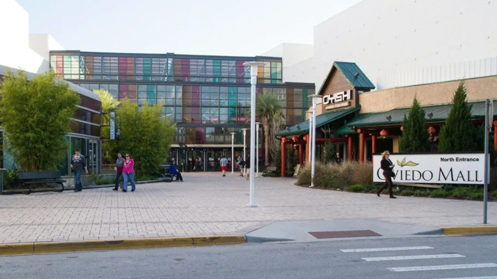 A modern shopping center with a variety of stores, restaurants, and entertainment options.