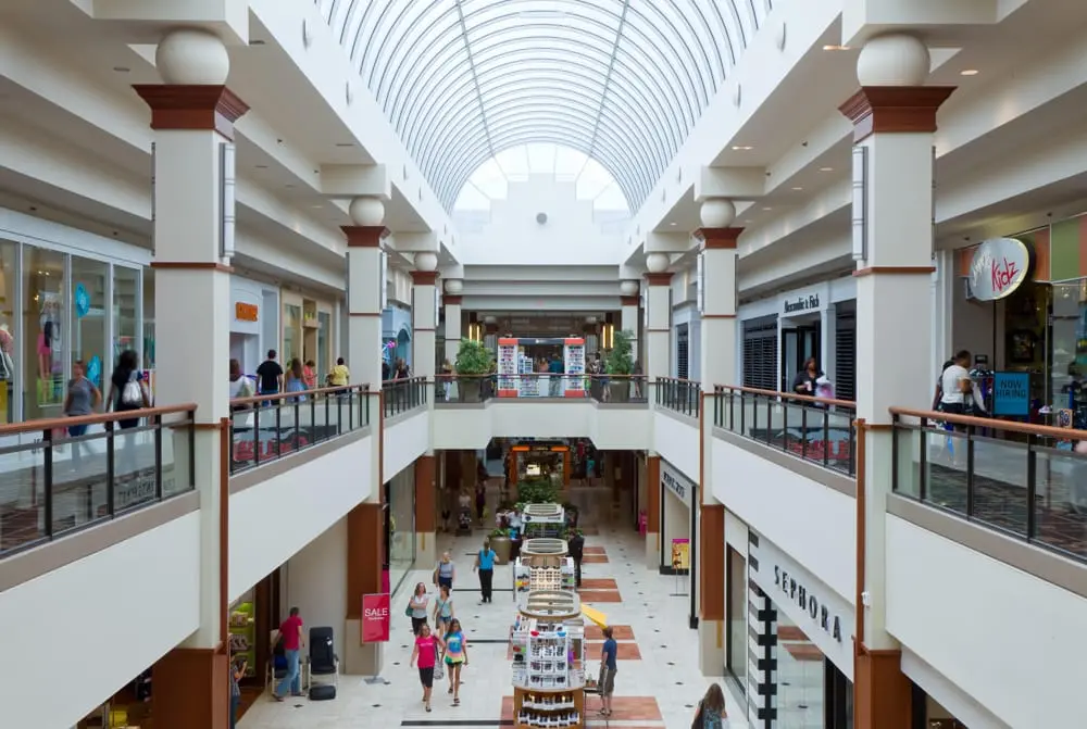 Interior of Town Center at Cobb mall with shoppers walking around.