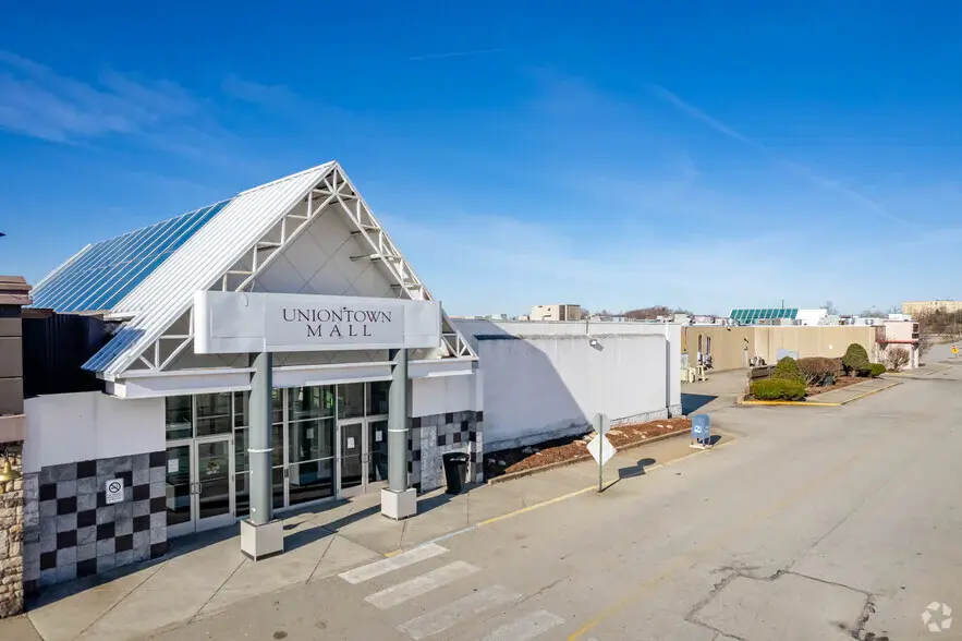 Exterior of Uniontown Mall with spacious parking lot.