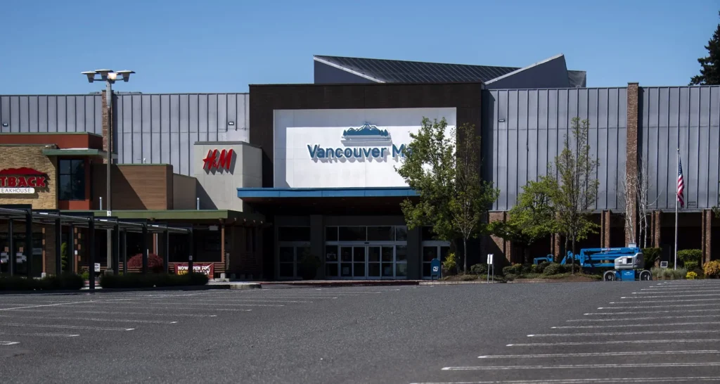 A large building with a sign that says Woodman's, located at Vancouver Mall.