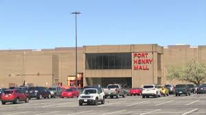 Fort Henry Mall parking lot filled with parked cars.