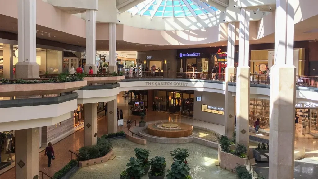 A large shopping mall with a large glass dome, Plaza Frontenac.