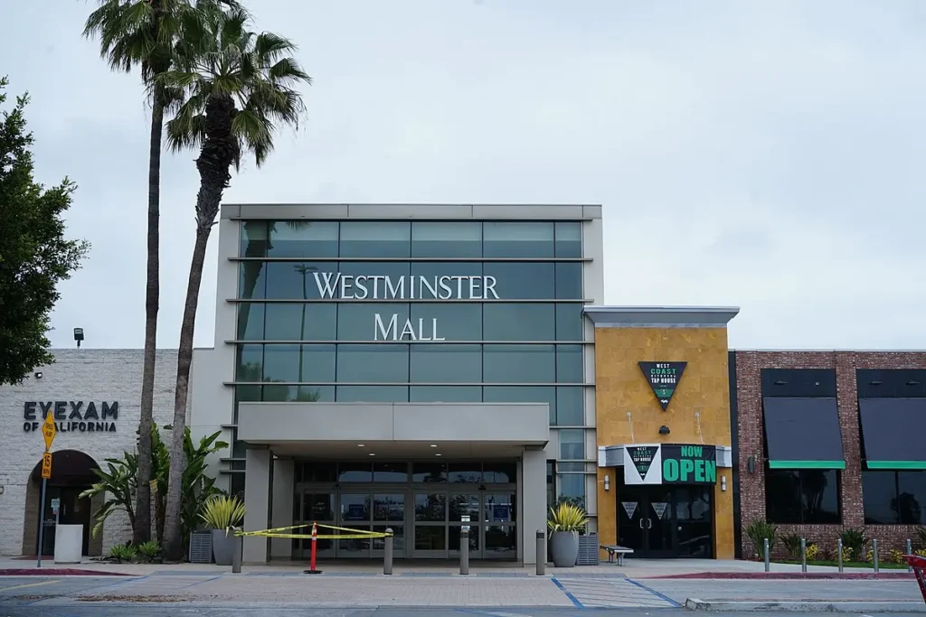 Westminster Mall in Los Angeles: A bustling shopping center with various stores and people strolling through its corridors.