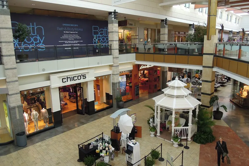 West County Mall featuring a variety of shops and busy shoppers.