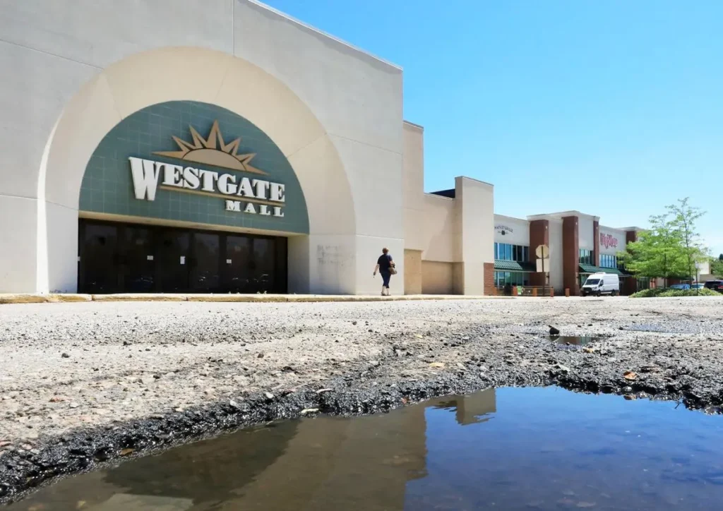 Pothole in Westgate Center Mall parking lot.