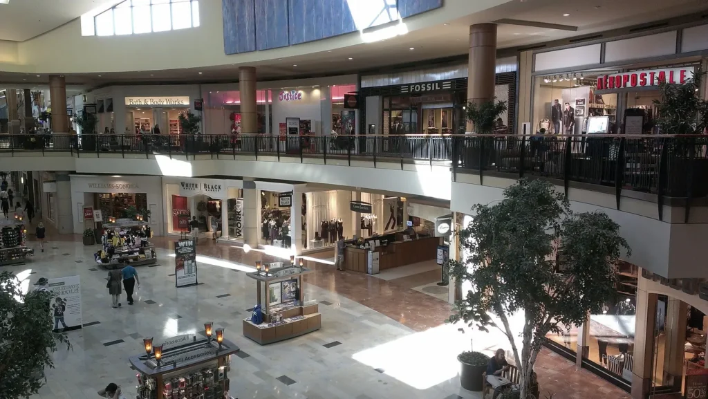 Jordan Creek Town Center Mall showcasing various stores and shoppers moving about.