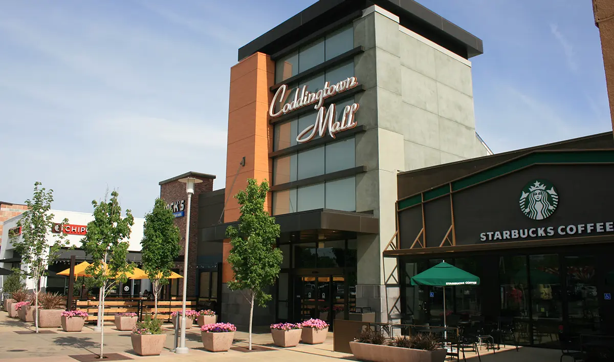 A bustling retail hub with a variety of stores, restaurants