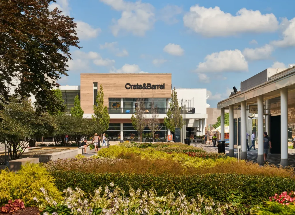 Oakbrook Center building with a spacious garden in front