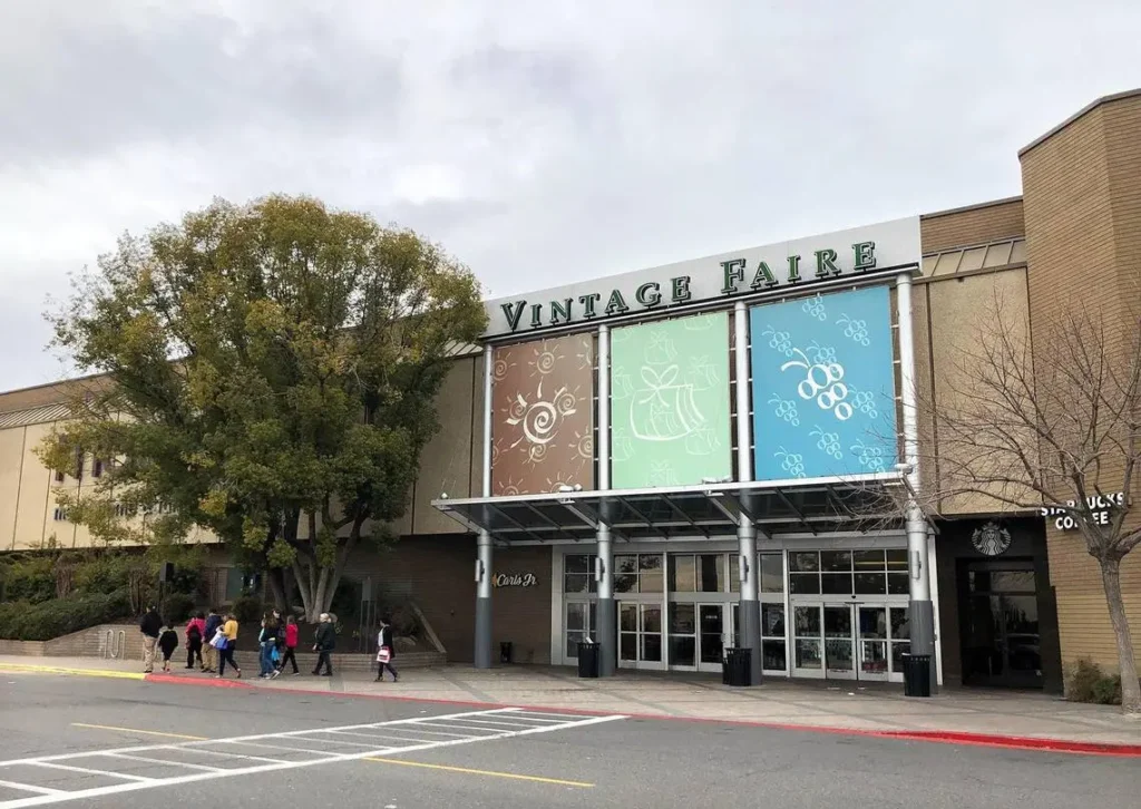 Aerial view of Vintage Faire Mall surrounded by parking lots and busy roads.