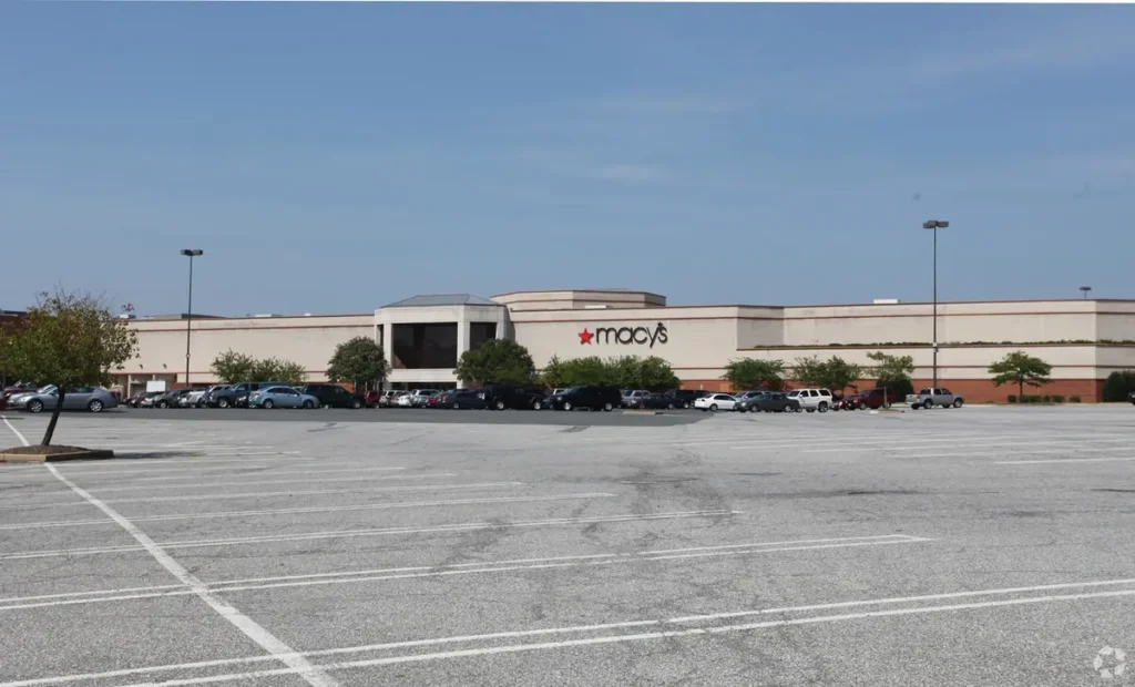 Exterior of St. Charles Towne Center Mall with people walking