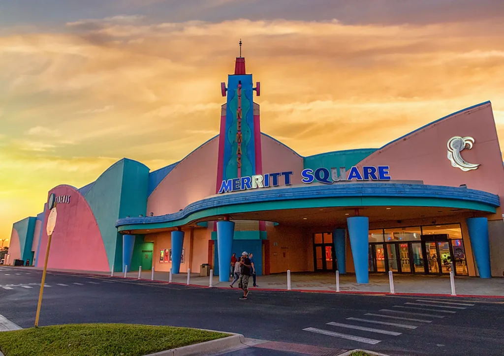 Colorful building with sign "Cinema Square" at Merritt Square Mall.