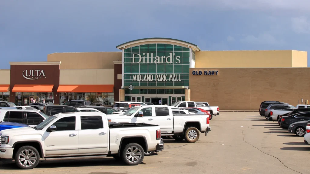 A bustling shopping center with a variety of stores, restaurants