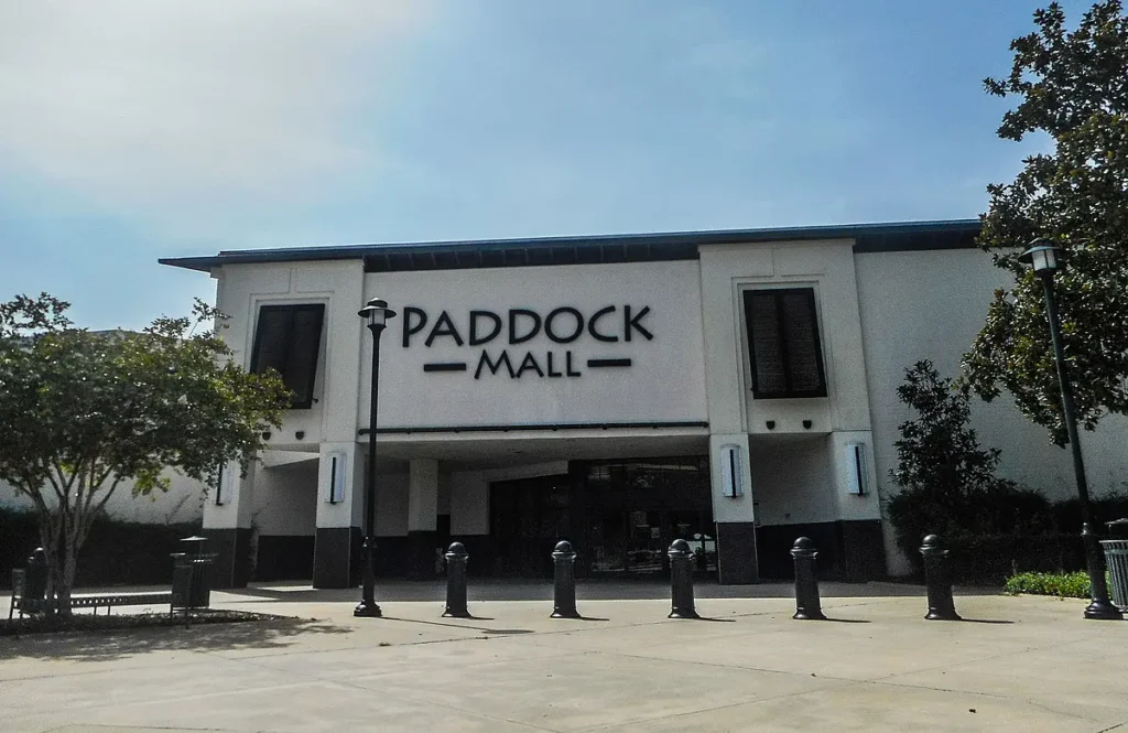 A large building with a sign that says Paddock Mall.