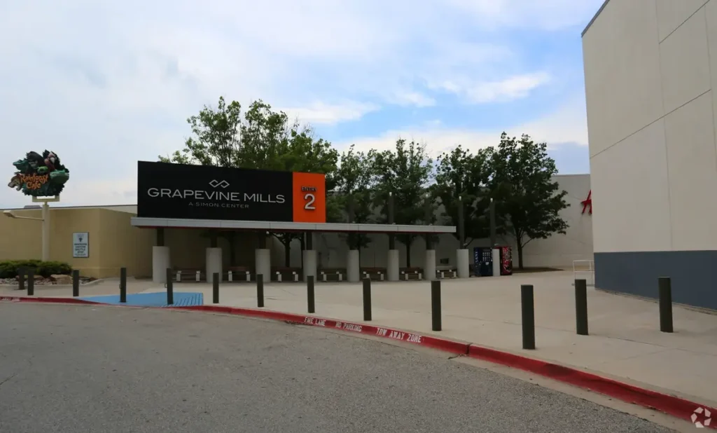 Grapevine Mills Mall entrance featuring a sign.