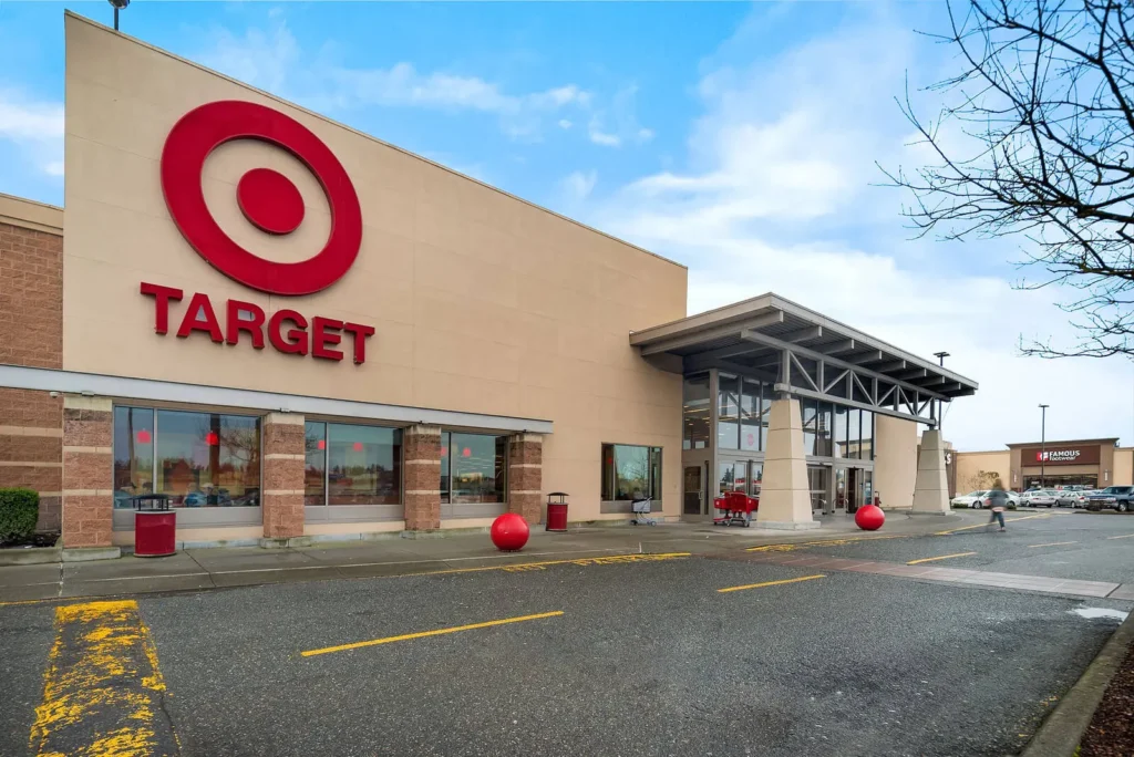 Busy entrance of Target Mall with shoppers walking in and out.