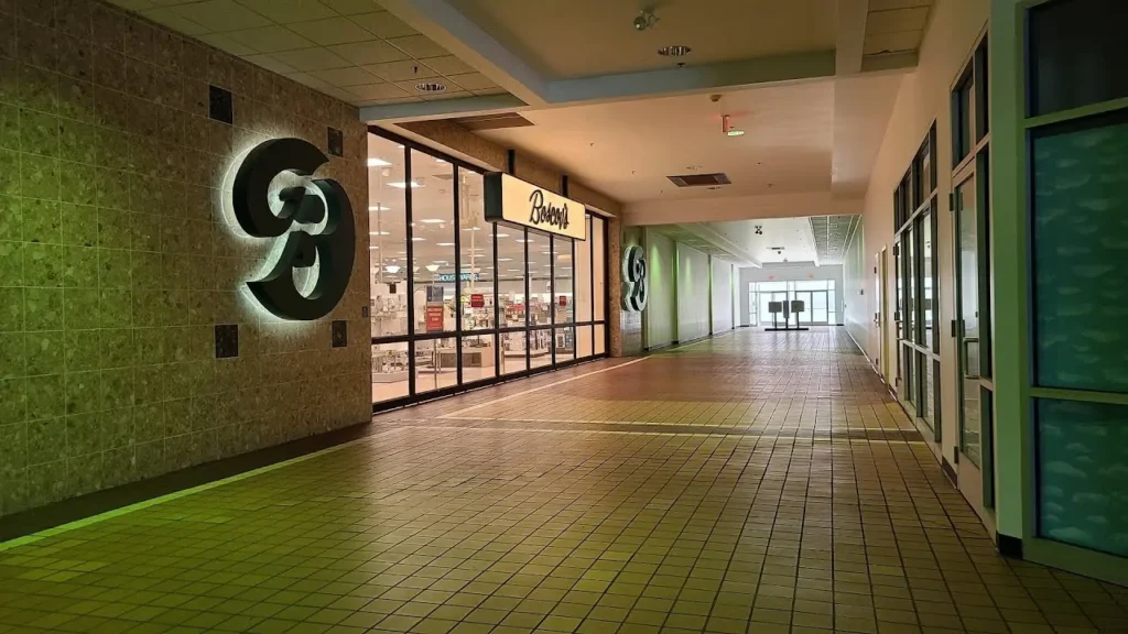 Sign 's' in a hallway at Camp Hill Shopping Center Mall.