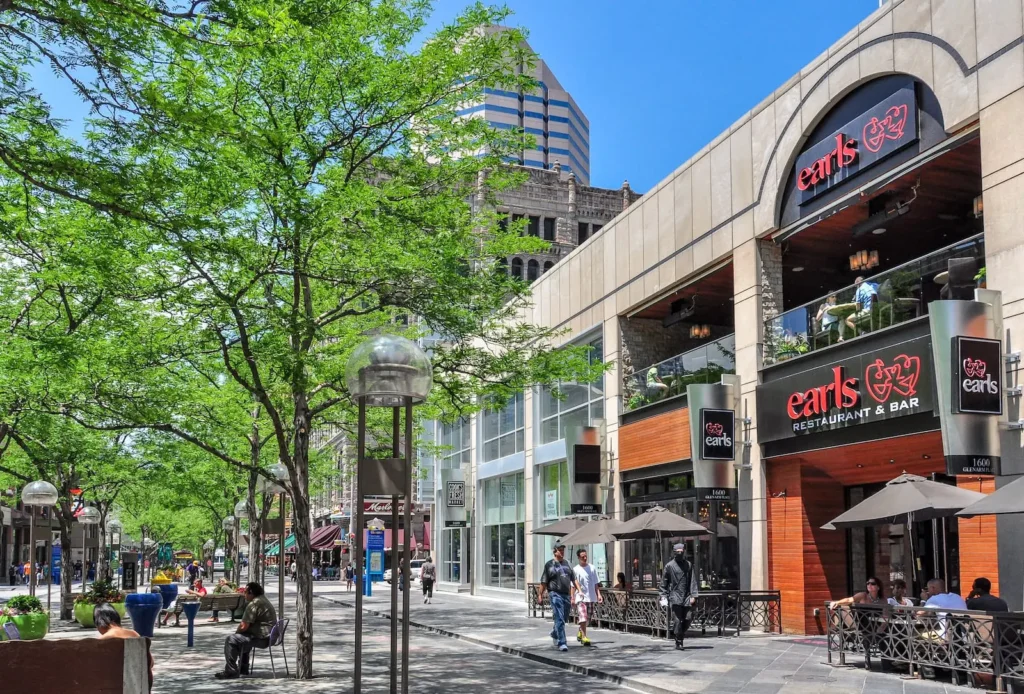 Urban street scene on 16th Street Mall with people strolling