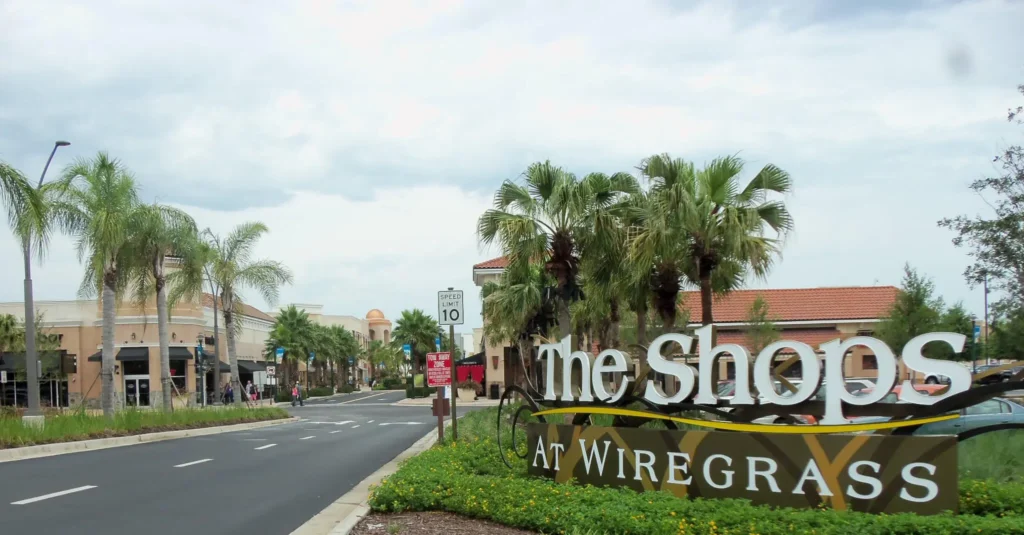 A bustling shopping center with modern architecture