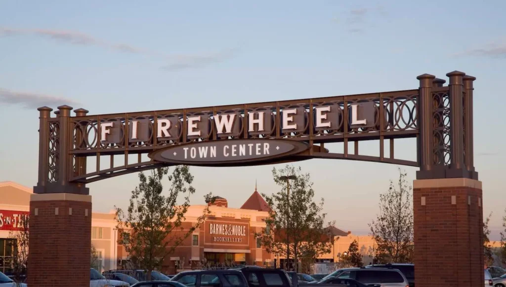 "Firewheel Town Center Mall sign in parking lot"