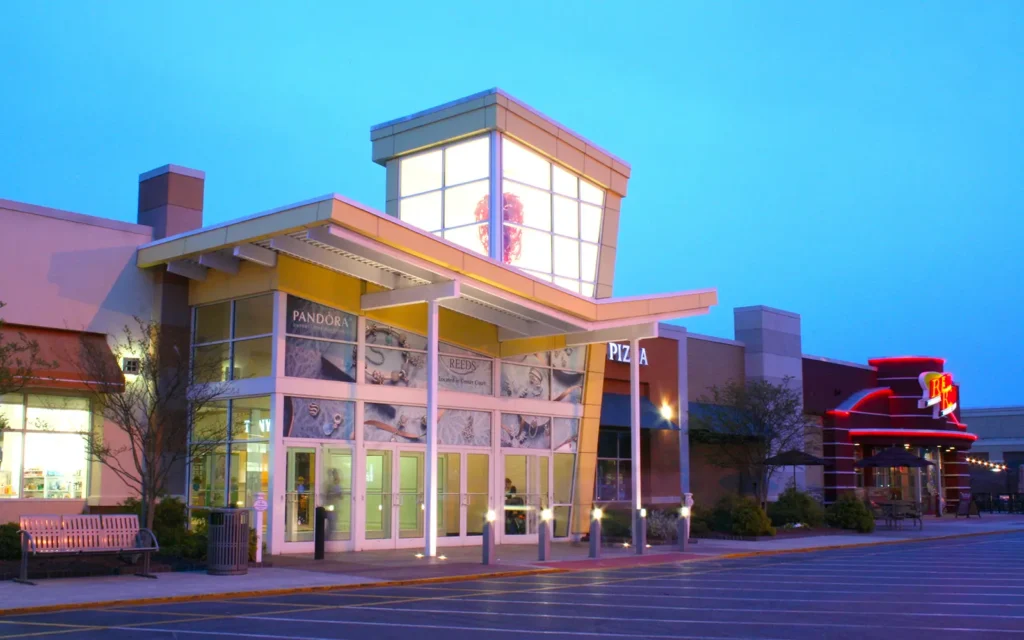 A large building with a sign that reads 'Jacksonville Mall'.