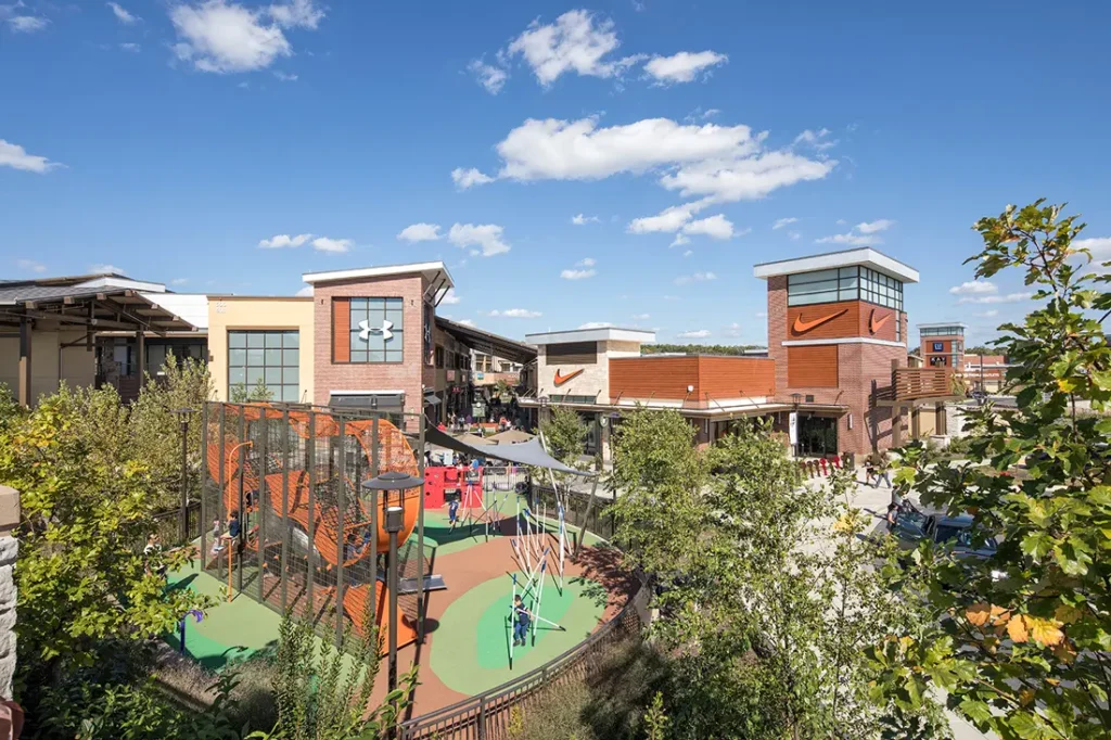 cenic view of playground and buildings at Clarksburg Premium Outlets.
