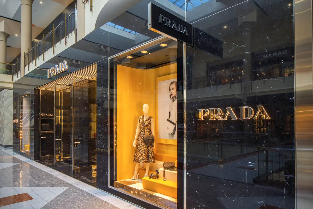 A luxurious boutique showcasing Prada's exquisite fashion