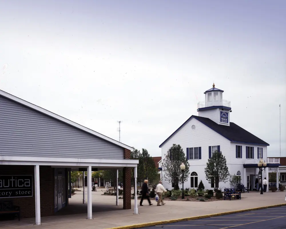 Lighthouse Place Premium Outlets Mall building with clock tower.